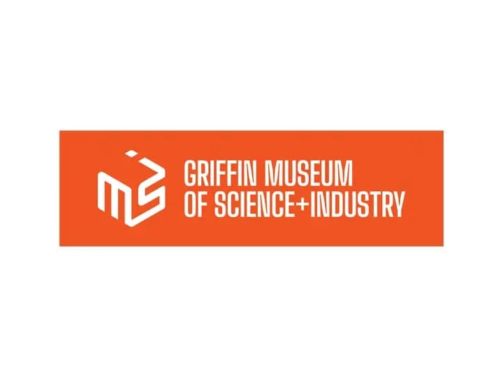 Logo featuring a white emblem and text on an orange background. The text reads, "GRIFFIN MUSEUM OF SCIENCE+INDUSTRY." The emblem resembles a stylized letter design.