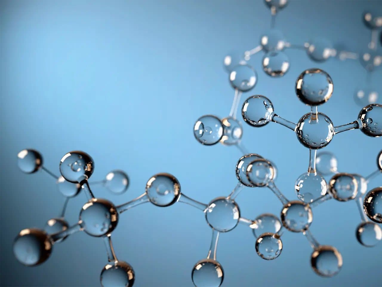 Transparent molecular structures connect via thin rods, forming a complex network. The molecules resemble clear spheres, set against a soft blue background, suggesting a scientific or chemical theme.